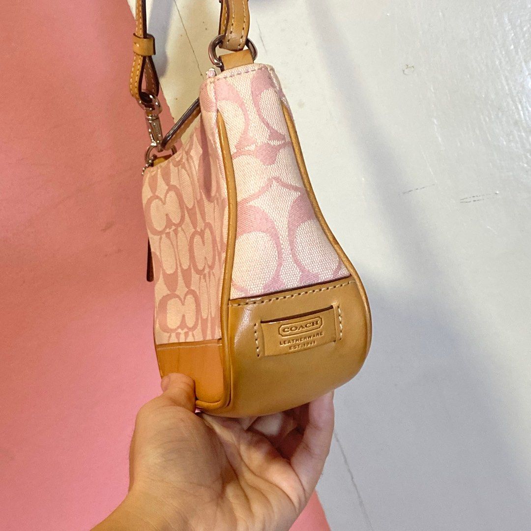 Coach Pink Demi Pochette (Category: Luxury Bags & Wallets) located in Batangas. Submitted by avery.declutter (Listing ID 1272358998, Image 3). Description: Coach Demi Pochette 🪞🎀👛 • Guaranteed AUTHENTIC • RANK AB • No issue (minimal signs of usage) • Hardware: Silver Tone • Ready to use • Free shipping 🛻 This bag looks so PRETTY in person 🥰.