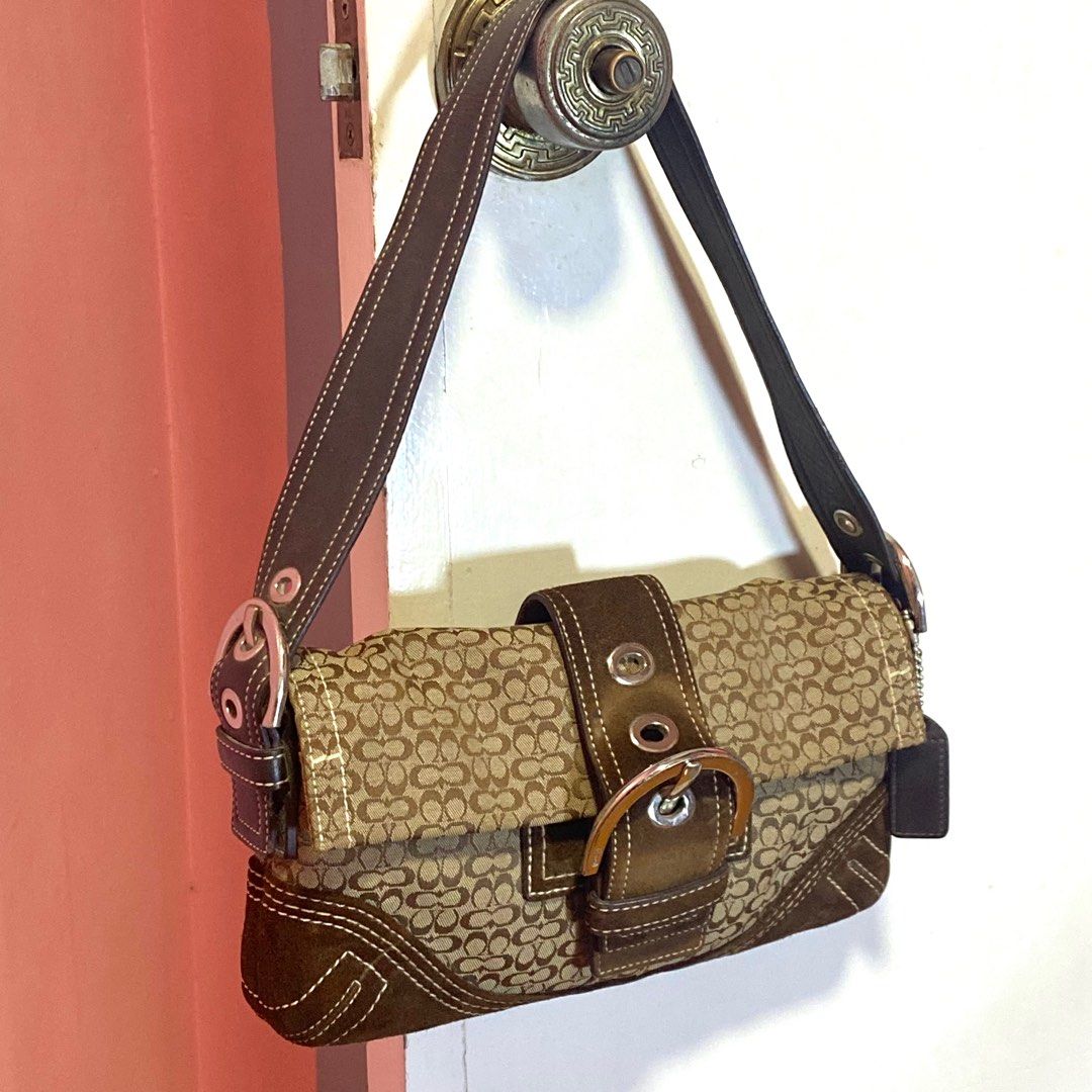Coach Soho Buckle Bag (Category: Luxury Bags & Wallets) located in Batangas. Submitted by avery.declutter (Listing ID 1272359485, Image 2). Description: Coach Soho Buckle Bag 🤎🫶🏻 • Guaranteed AUTHENTIC • Rank AB (in very good condition) • Hardware: Silver • Ready to use • No issue! • Free sf via Flash Express .