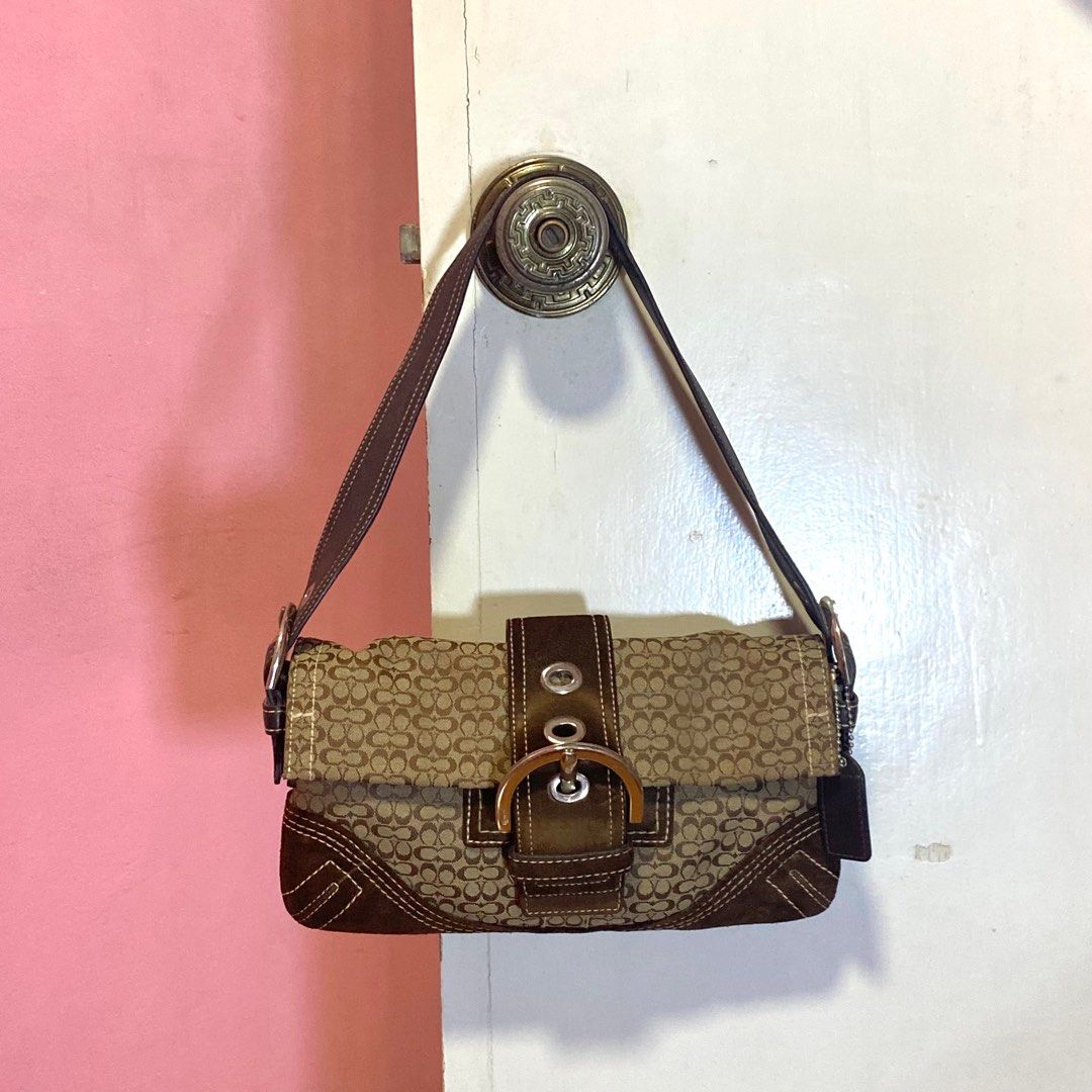 Coach Soho Buckle Bag (Category: Luxury Bags & Wallets) located in Batangas. Submitted by avery.declutter (Listing ID 1272359485, Image 1). Description: Coach Soho Buckle Bag 🤎🫶🏻 • Guaranteed AUTHENTIC • Rank AB (in very good condition) • Hardware: Silver • Ready to use • No issue! • Free sf via Flash Express .