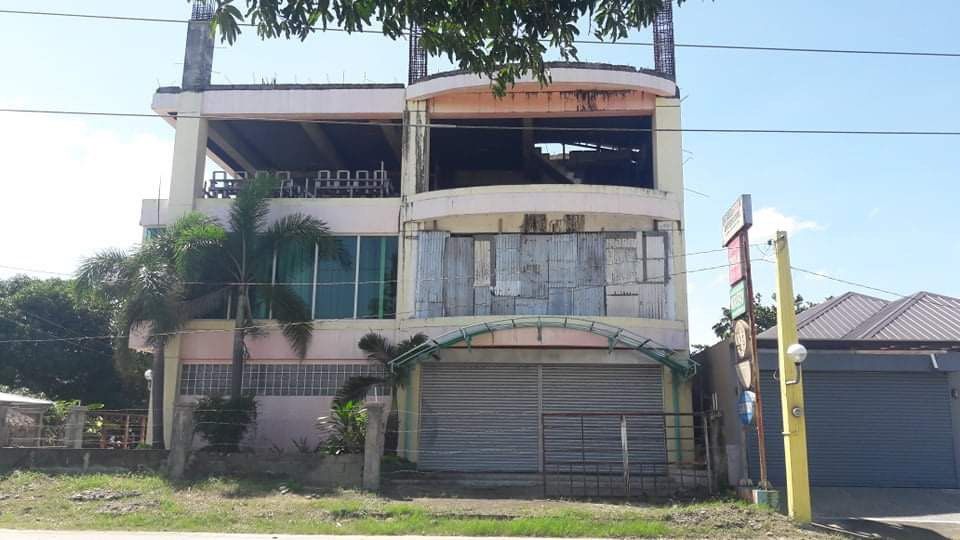 Commercial building and lot for sale along Bacarra National Highway