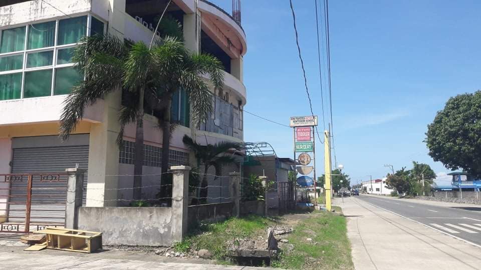 Commercial building and lot for sale along Bacarra National Highway