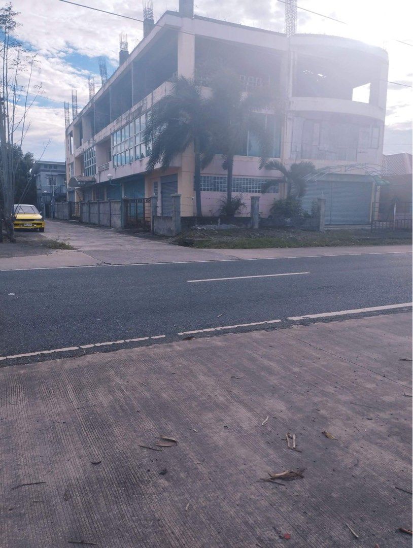 Commercial building and lot for sale along Bacarra National Highway