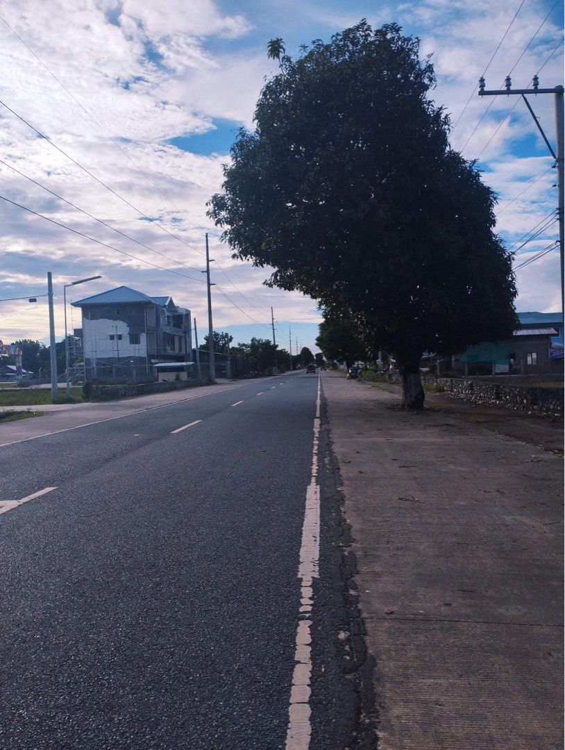 Commercial building and lot for sale along Bacarra National Highway