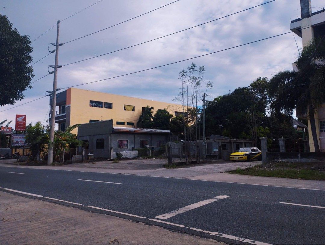 Commercial building and lot for sale along Bacarra National Highway