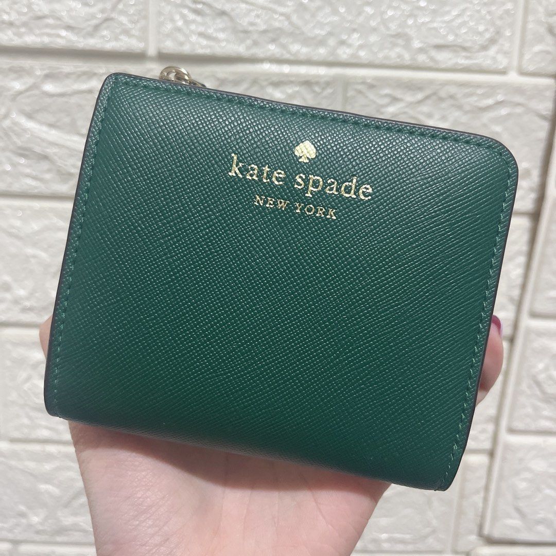 Olive green kate spade wallet deals