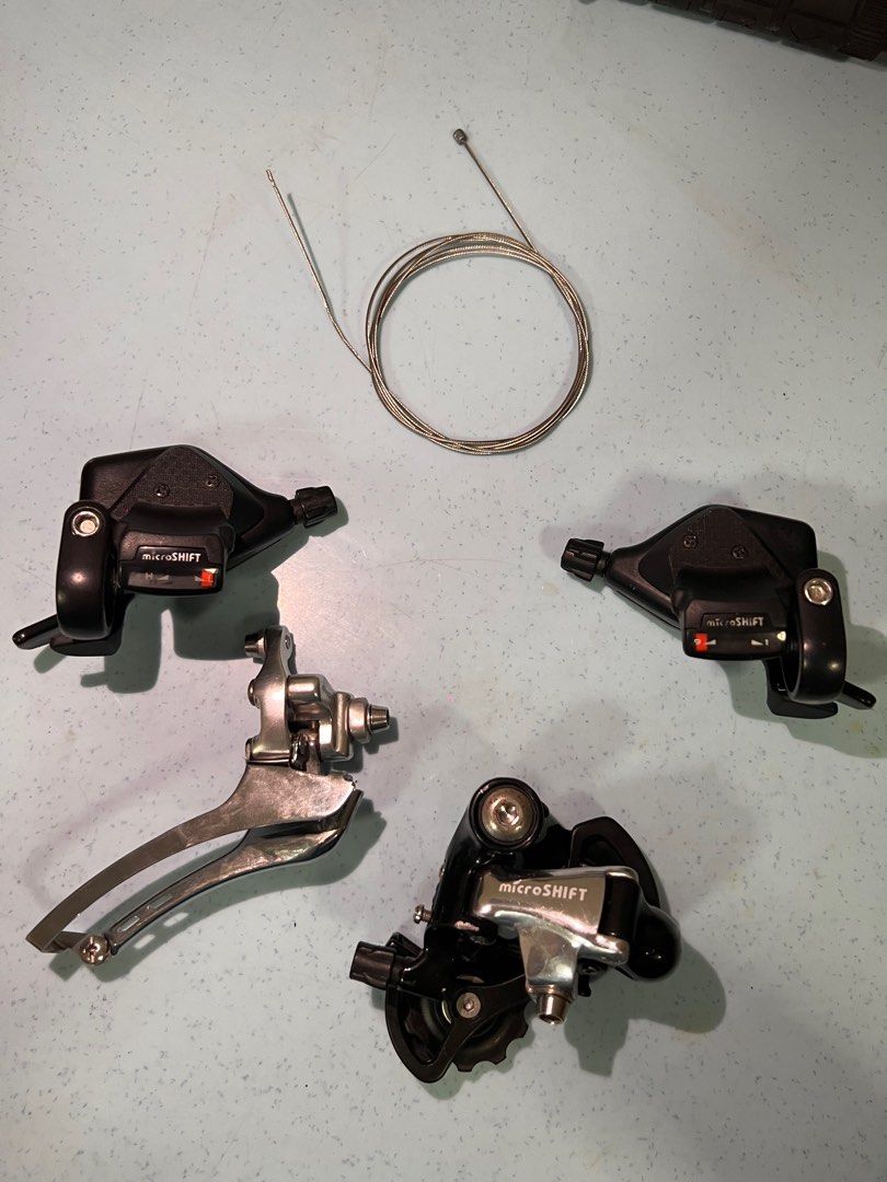 Microshift 9s partial groupset (Category: Parts & Accessories) located in Singapore. Submitted by tommmiiieeee (Listing ID 1272436423, Image 1). Description: Used groupset 3x9 speed Recommended for foldie/flatbar bicycle Shifter gear indication working flawlessly Minor scratch on rear derailleur Comes with 1x front derailleur shifter cable new Selling at $50 non-nego.