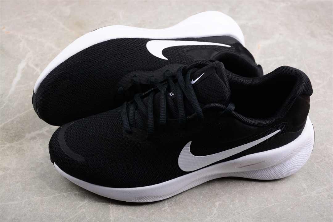 Black and white 'revolution running shoes on sale