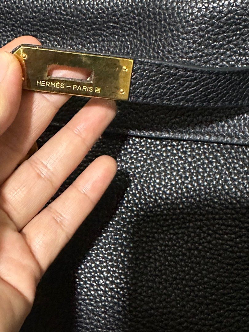 PRELOVED. HERMES KELLY LIMITED S30 (Category: Luxury Bags & Wallets) located in Manila. Submitted by preloved.brand2023 (Listing ID 1272375132, Image 3). Description: Preloved from Korea. Limited edition with horse square logo and riri zipper with code. Minimal sign of use only. No sling strap included.