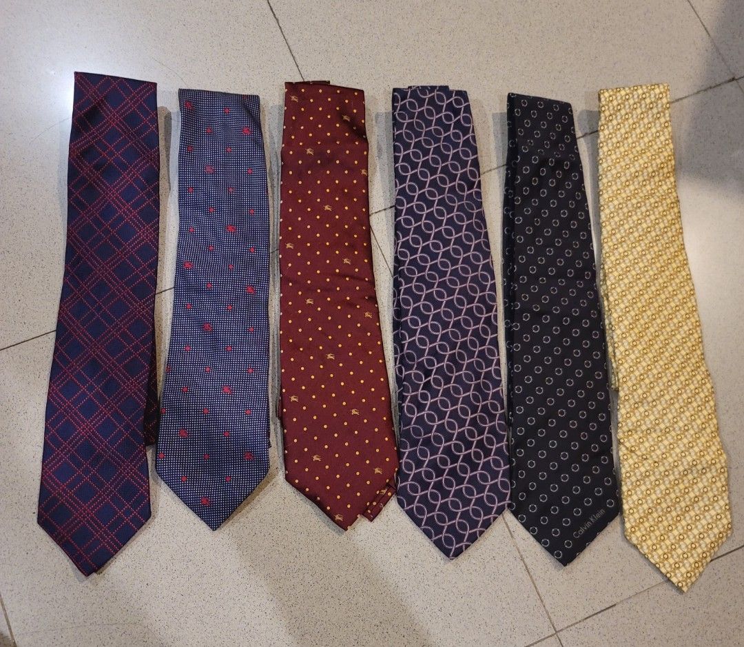 Pre-loved Luxury Neck ties from Japan. (Category: Ties) located in Taytay. Submitted by aimeecia28 (Listing ID 1272436393, Image 1). Description: Pre-loved Neck ties from Japan No issue 650 each or 3.5k for all Gucci Burberry Calvin Klein Dunhill pm for more details.
