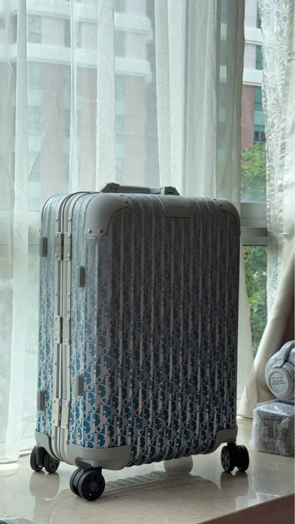 Rimowa dior best sale suitcase