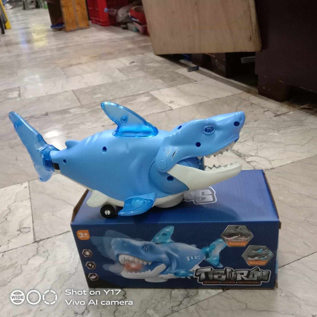 Shark with light sounds battery operated (Category: Kids Toys) located in Quezon City. Submitted by hereshop80 (Listing ID 1272456561, Image 3). Description: .