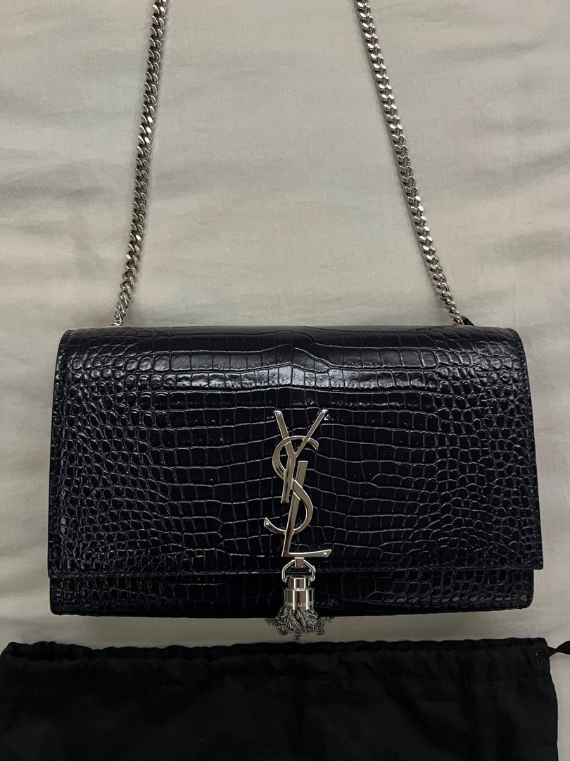 YSL Kate Medium Croc Embossed with Tassel (Category: Luxury Bags & Wallets) located in Makati City. Submitted by tidying_up_ (Listing ID 1272369663, Image 1). Description: Brand new Color: Silver chain and tassel, midnight blue Comes with original dust bag and YSL paper bag Bought from Europe DM for more pics. Slightly negotiable RFS: decluttering, funds for new bag.