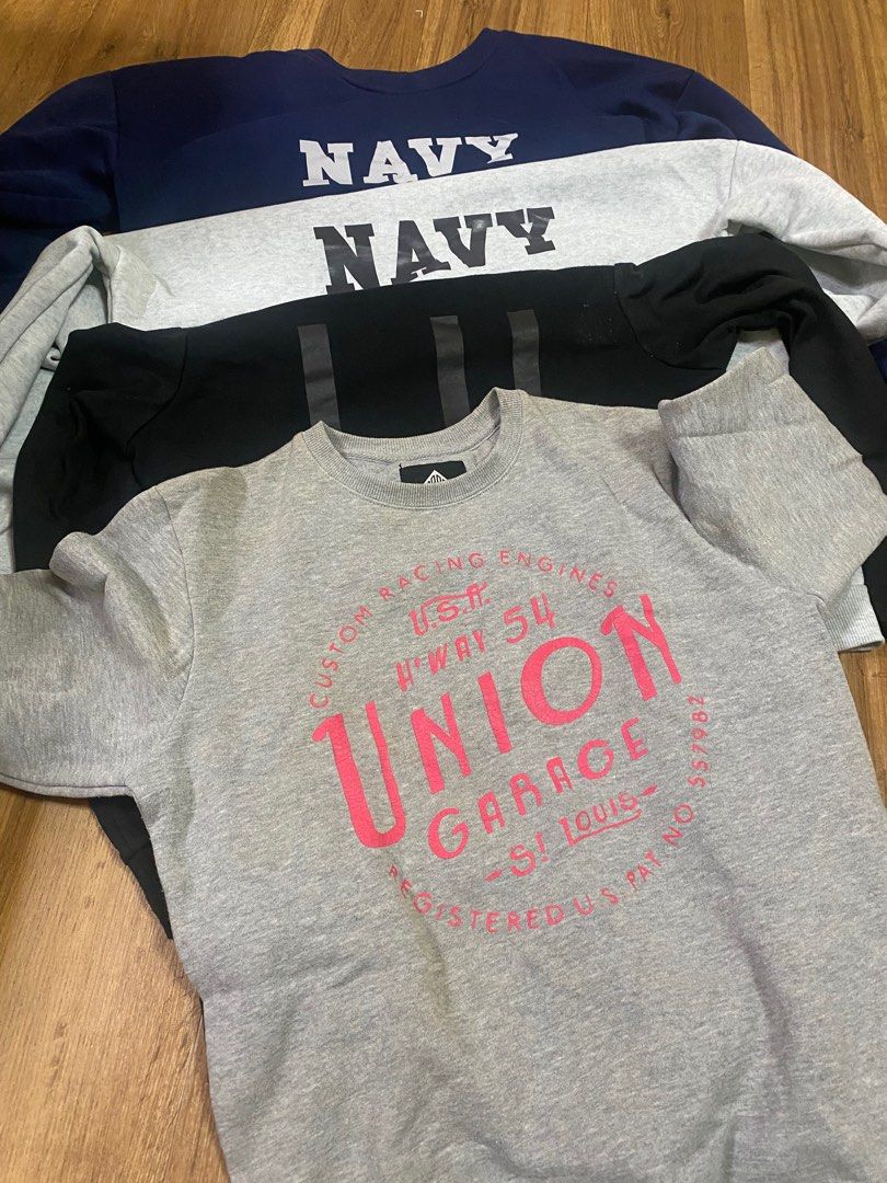 Assorted sweaters (Category: Hoodies) located in Singapore. Submitted by retrofeeds (Listing ID 1272504155, Image 1). Description: Assorted sweaters, size M, the 2 with Navy wording are slightly oversized. Bought at $25-35 each, selling at $10 each, all 4 at $35. PM for details..