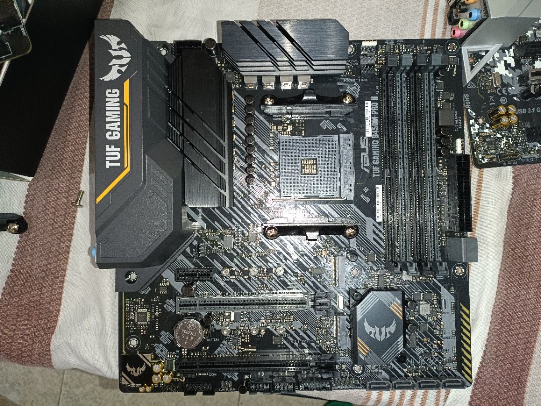 Asus B450M-PRO II (Category: Computer Parts) located in Pasig City. Submitted by olxph_97084647 (Listing ID 1272604405, Image 1). Description: Selling Asus B450M-PRO II Brandnew Issue: Bios flashback button broken Tested working .