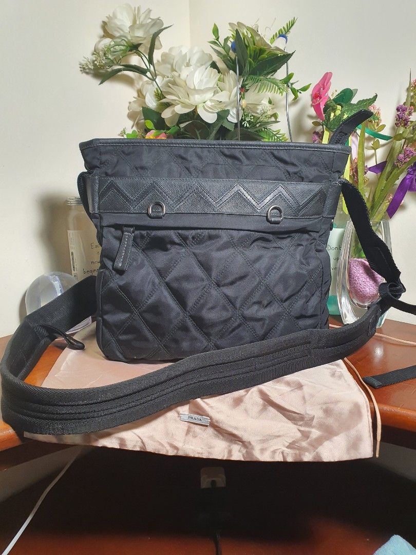 Authentic💯 Prada Black Nylon Messenger Bag (Category: Luxury Bags & Wallets) located in Tagum. Submitted by maryjanepradalux (Listing ID 1272575108, Image 1). Description: *No inclusion *my kunting crack *Slightly used *bought from singapore *Money Back Guarantee if proven fake *Pm for more details.