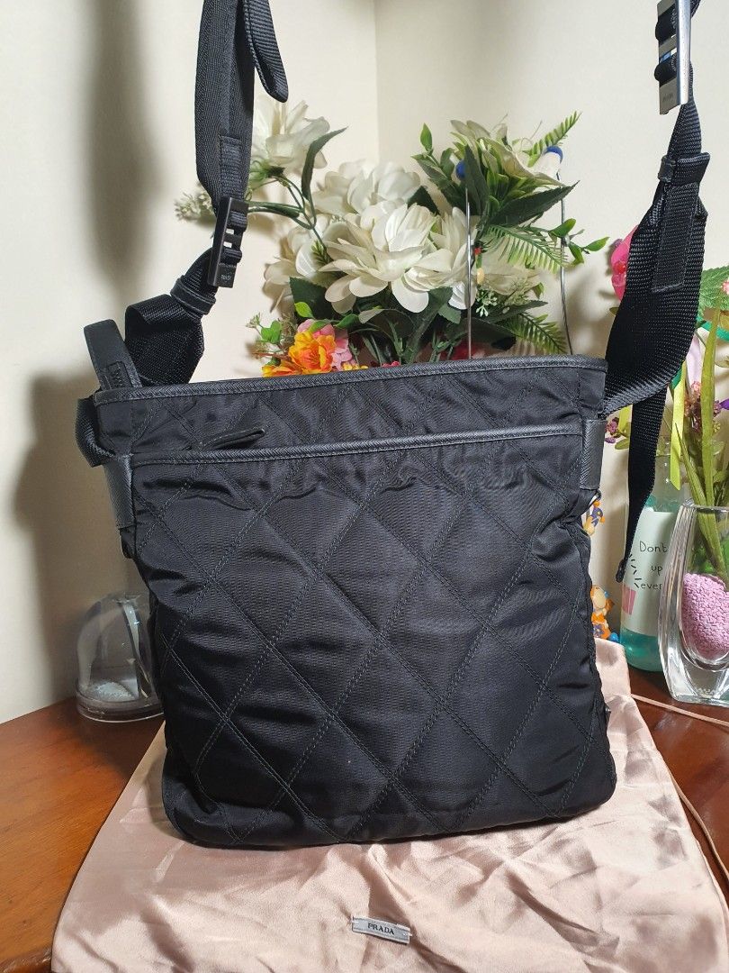 Authentic💯 Prada Black Nylon Messenger Bag (Category: Luxury Bags & Wallets) located in Tagum. Submitted by maryjanepradalux (Listing ID 1272575108, Image 3). Description: *No inclusion *my kunting crack *Slightly used *bought from singapore *Money Back Guarantee if proven fake *Pm for more details.