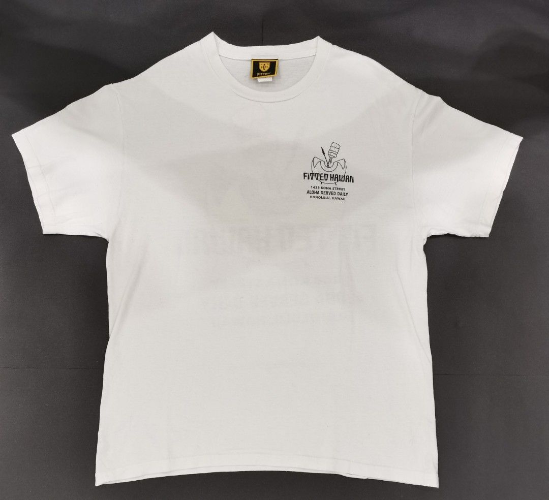 https://media.karousell.com/media/photos/products/2023/12/19/fitted_hawaii_white_tee_1703021604_86af440e_progressive.jpg