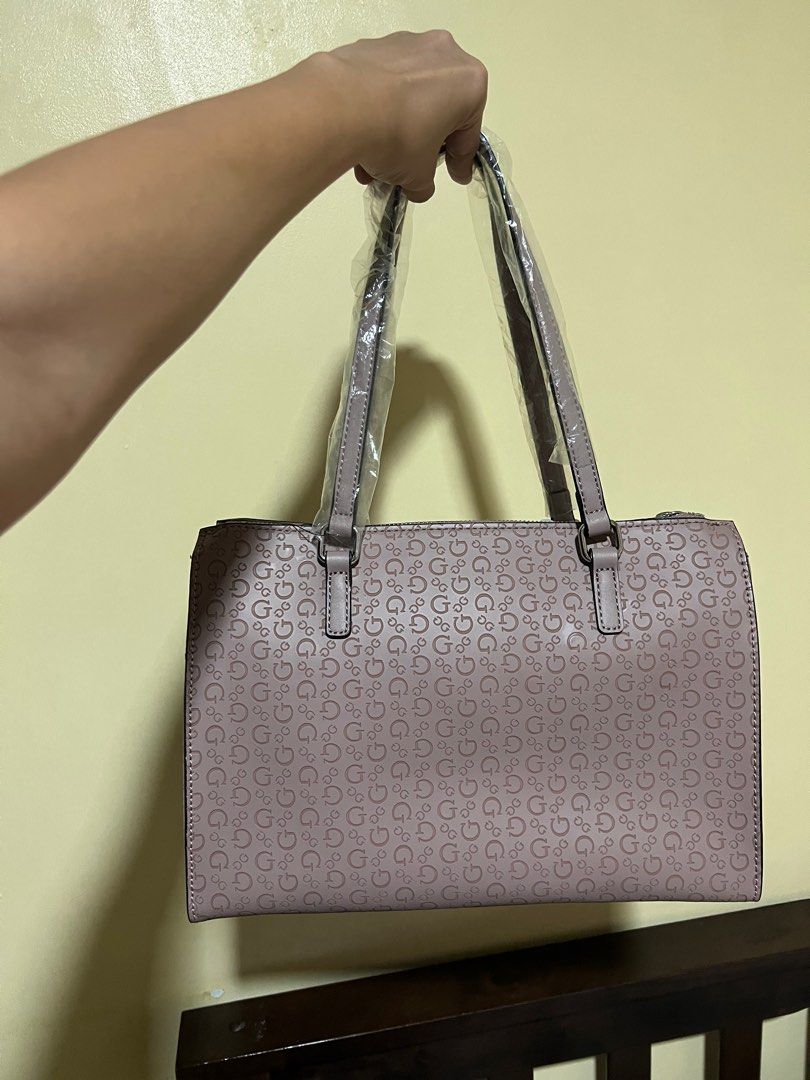 Guess Booker Satchel Bag (Category: Shoulder Bags) located in Cainta. Submitted by stuff01 (Listing ID 1272539676, Image 2). Description: 💯Authentic Bought in Malaysia Brand New Never used, just stored Flaw: Part of one side has a little chip off but unnoticeable (see last photo).