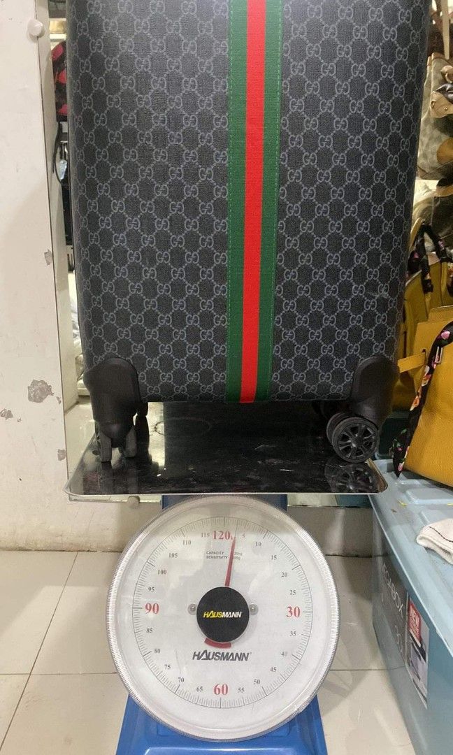 Gucci 110 luggage store
