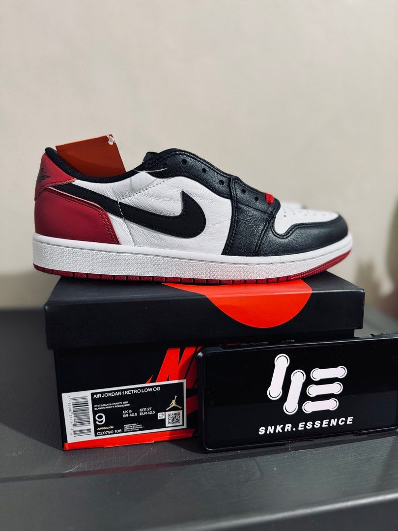 low top black toe 1s