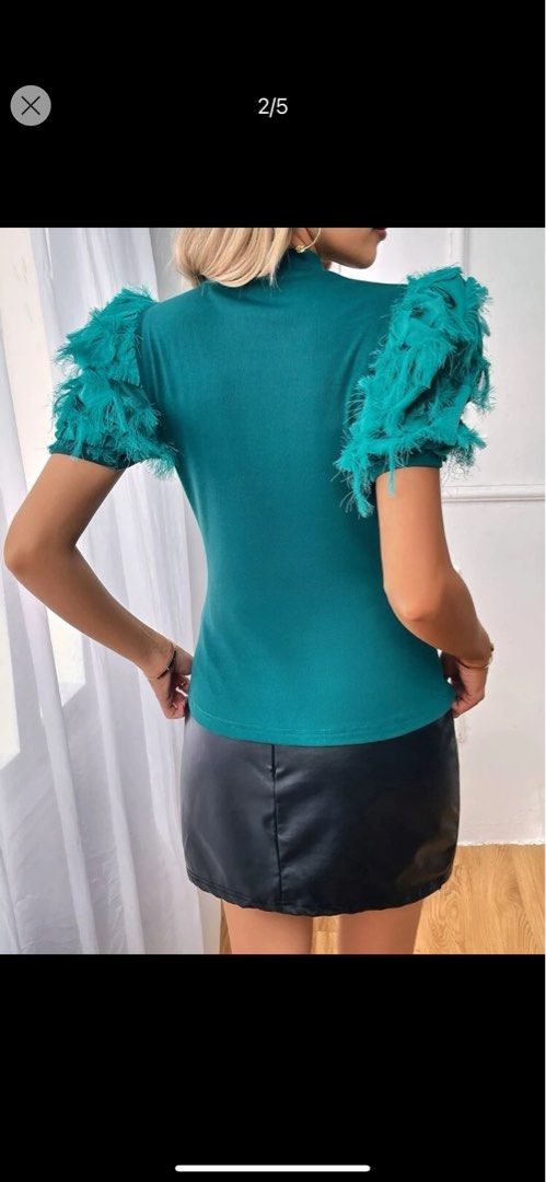 SHEIN Feathery Sleeves Soft Turquoise Top (Category: Blouses) located in Manila. Submitted by luxeauthentics (Listing ID 1272537828, Image 2). Description: New Impulsive purchase Size Small Stretchable fabric.