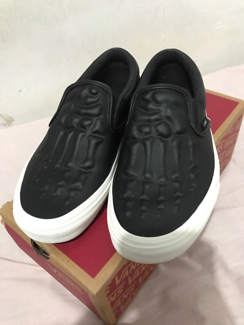 Vans slip on bones best sale