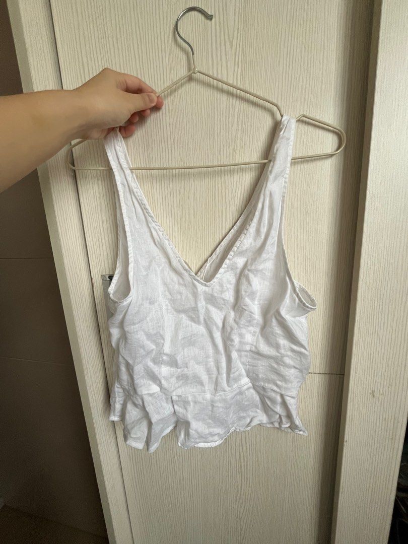White linen top (Category: Blouses) located in Manila. Submitted by kimtaeri21 (Listing ID 1272467162, Image 3). Description: .