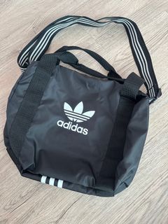 brand new adidas tote and sling beg size : W 35 cm x 28 H