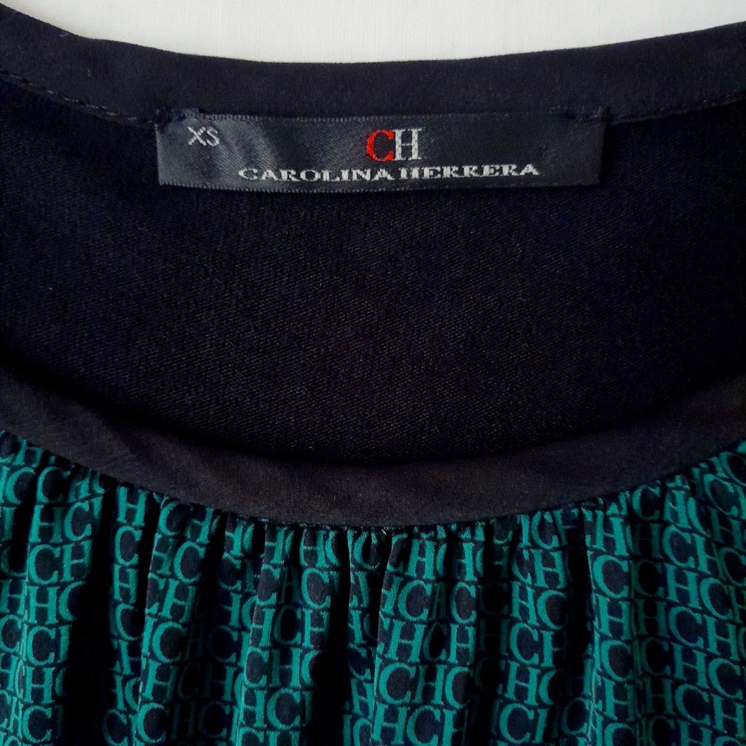 Carolina Herrera Knit Longsleeves Top (Category: Luxury Apparel) located in Quezon City. Submitted by lovedlux (Listing ID 1269006020, Image 2). Description: CH chic! Fits XS-S Front fabric in flowy silk CH signature print Fine wool knit no snags or pilling Chat for measurements A plain cropped Carolina Herrera knitted cardigan retails at P27K after 50% off!.