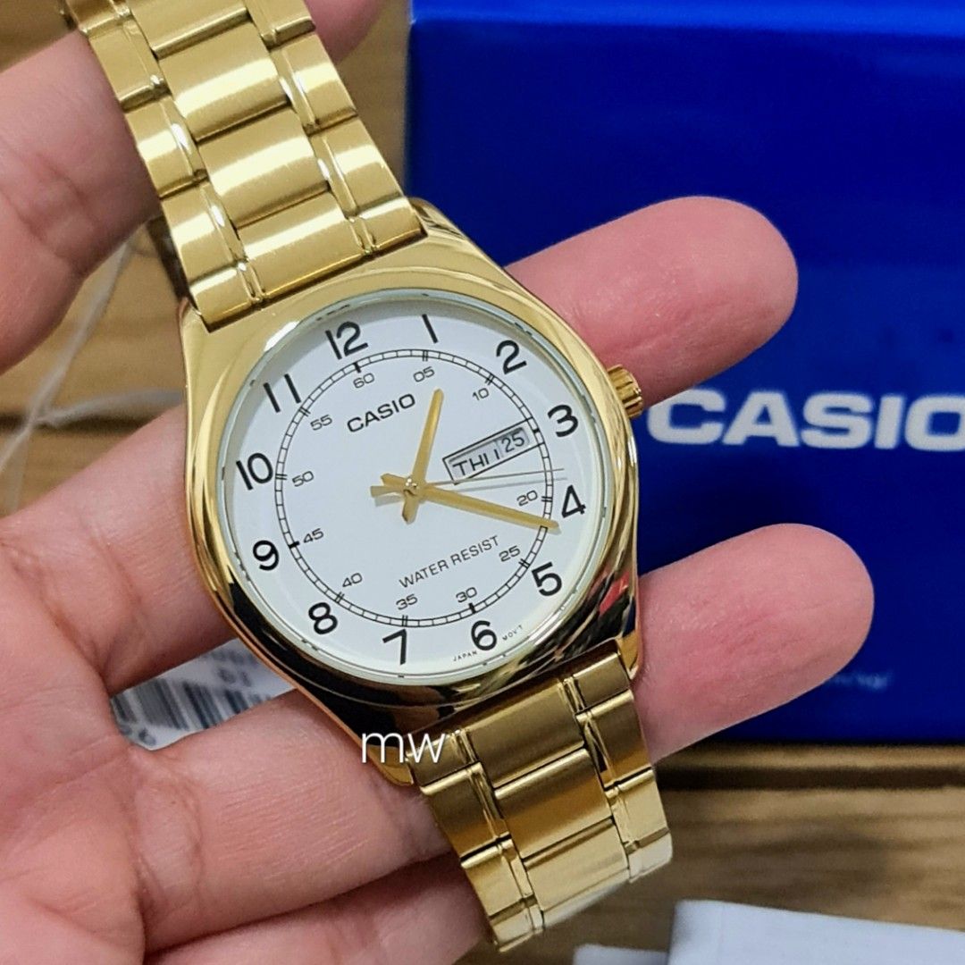 CASIO MEN S FASHION GOLD TONE EASY TO READ QUARTZ WATCH MTP V006G 7B DAY DATE