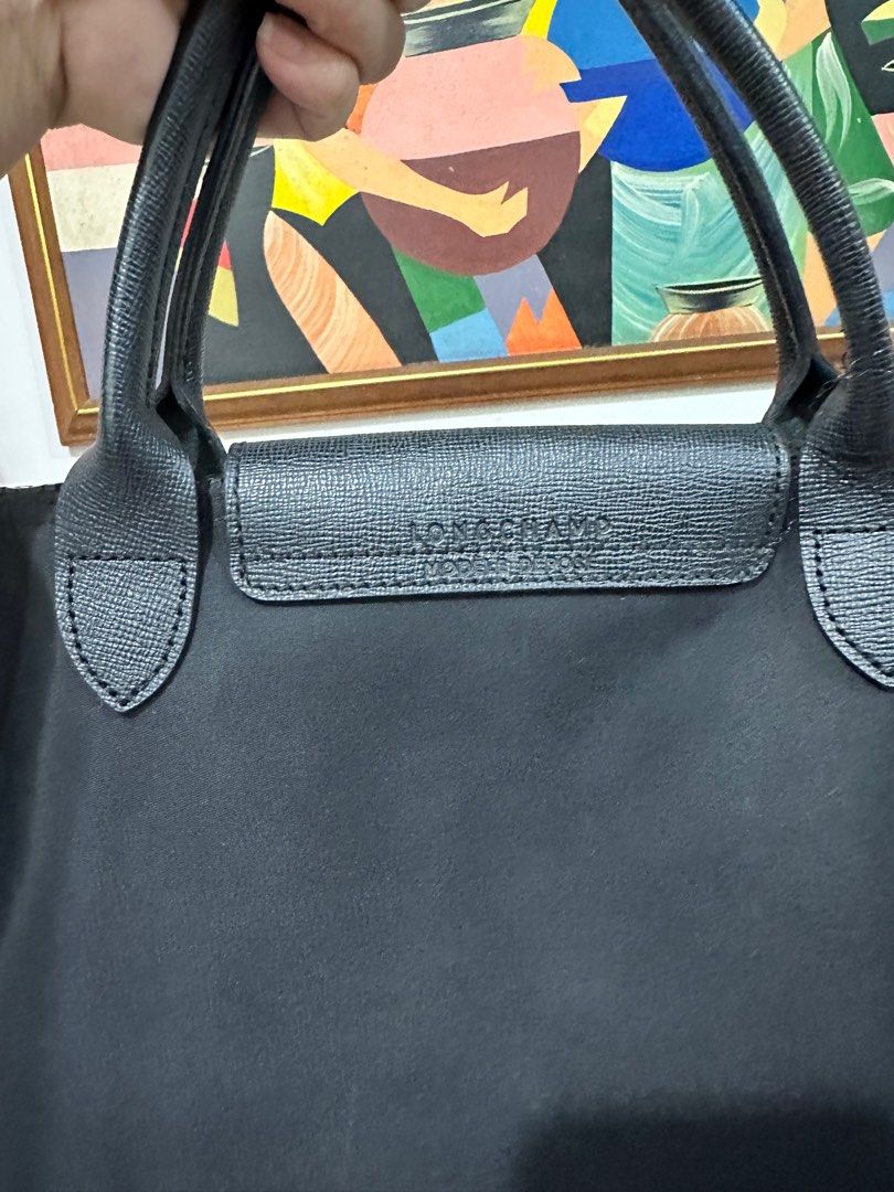 🔥💯LONGCHAMP🔥 Neo Medium - Black (preloved) (Category: Cross-body Bags) located in Mandaluyong City. Submitted by StuffofMyDreamsph (Listing ID 1268923843, Image 3). Description: LONGCHAMP NEO SLING BAG (Black) 🤝 Preloved but well LOVED ❤️ 🤝 Usual sign of usage (folds/ konteng rubs) 🤝 This travel bag with a detachable shoulder strap 🤝 Size:: 10.8x12.5x7inches 🤝 Soft and lightweight 🤝Minimal & unseen flaws must be considered.. 🤝Color rate