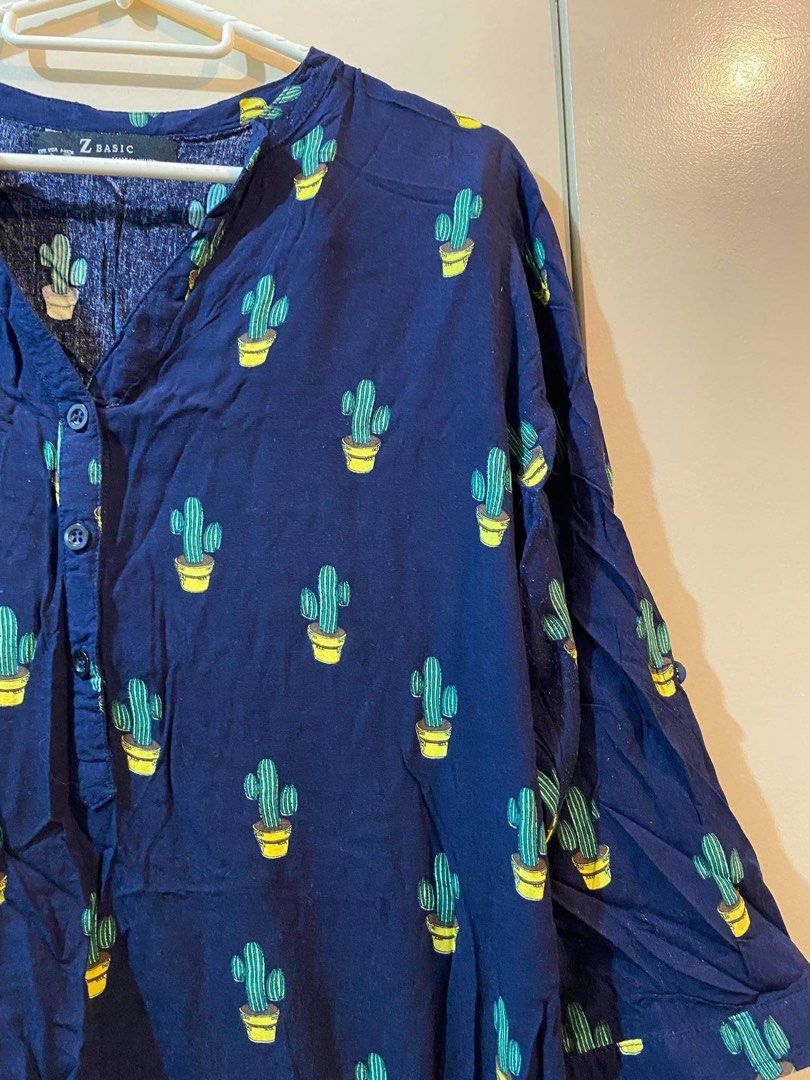 Cactus Print top (Category: Blouses) located in Marikina City. Submitted by micharon (Listing ID 1268917282, Image 2). Description: 3/4 Sleeve Local brand B 36-38 L 25.
