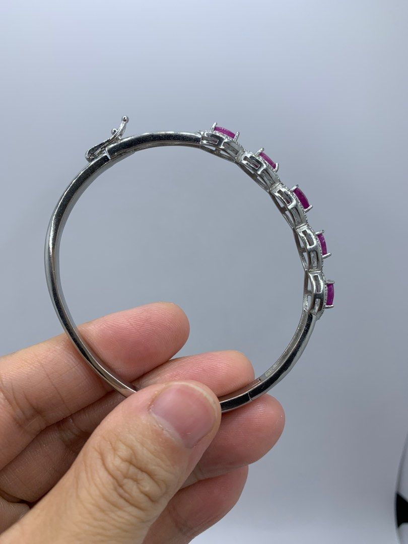 Pink Ruby bracelet/bangle (Category: Bracelets) located in Singapore. Submitted by llovecoffee (Listing ID 1265973321, Image 3). Description: Brand New Natural precious stone Ruby. Setting on 925 Silver Inner diameter pls refer to pics Open buckle to wear on/remove Welcome to view before purchase Self collect or mailing .
