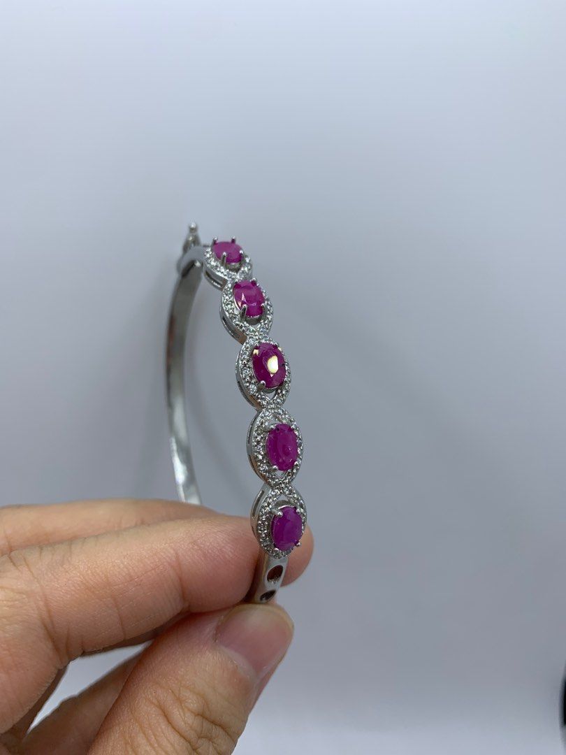 Pink Ruby bracelet/bangle (Category: Bracelets) located in Singapore. Submitted by llovecoffee (Listing ID 1265973321, Image 2). Description: Brand New Natural precious stone Ruby. Setting on 925 Silver Inner diameter pls refer to pics Open buckle to wear on/remove Welcome to view before purchase Self collect or mailing .