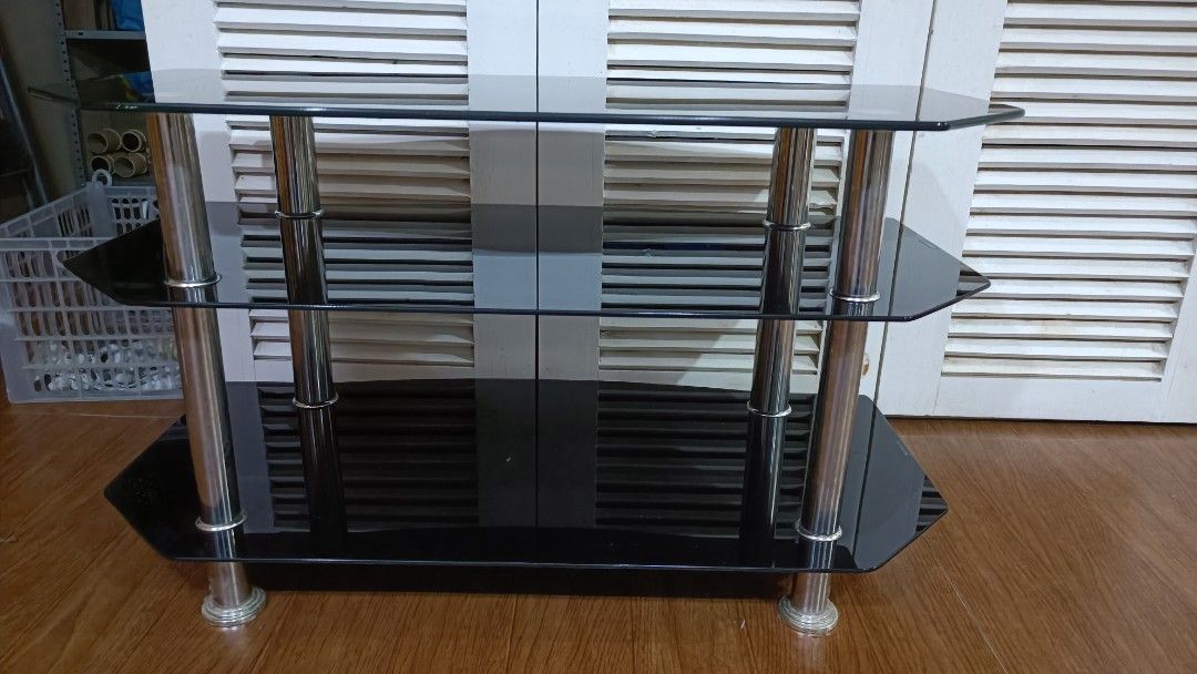 TV Entertainment Glass Table (Category: Tables & Sets) located in Quezon City. Submitted by m_here (Listing ID 1268938327, Image 2). Description: Glass Entertainment TV Table Almost new Pick up: Araneta ave Qc area.