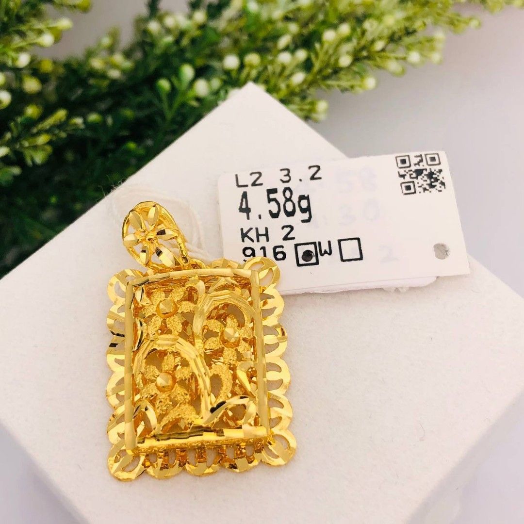 Gold pendant hotsell brand