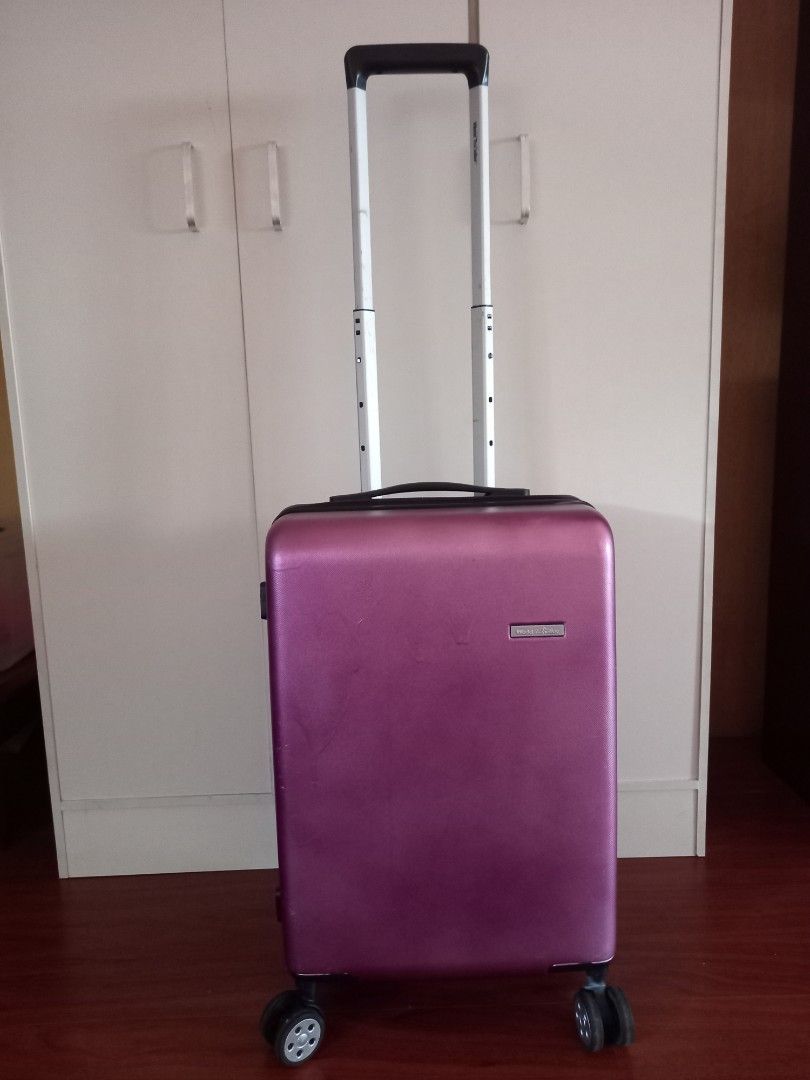 World Traveller 55 Spinner cabin sized (Category: Luggage) located in Quezon City. Submitted by maidenveil613 (Listing ID 1272727922, Image 1). Description: lightweight cabin sized 360 spinner wheels originally smoke grey but I repainted it to metallic purple (why? it was pandemic i had to release some grief for cancelled flights and being stuck at home) zipper and lock 10/10 wheels 9/10 handle 10/10 body 8/10 (7.5 if you judge my painting skills