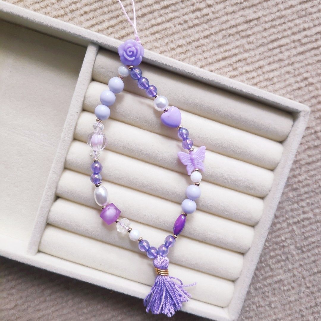 Cute Phone Charms 4 colors (Category: Mounts & Holders) located in Manila. Submitted by thestylevixen (Listing ID 1272800336, Image 1). Description: - materials: acrylic beads, faux pearls, glass crystals - size: 9.5-10 inches in diameter (fits wrist) - available in purple, white, pink, light blue. other colors may be available upon request. #phonecharms #pastel #phonestrap #beadlanyard #purple #phonelanyard #accessories.