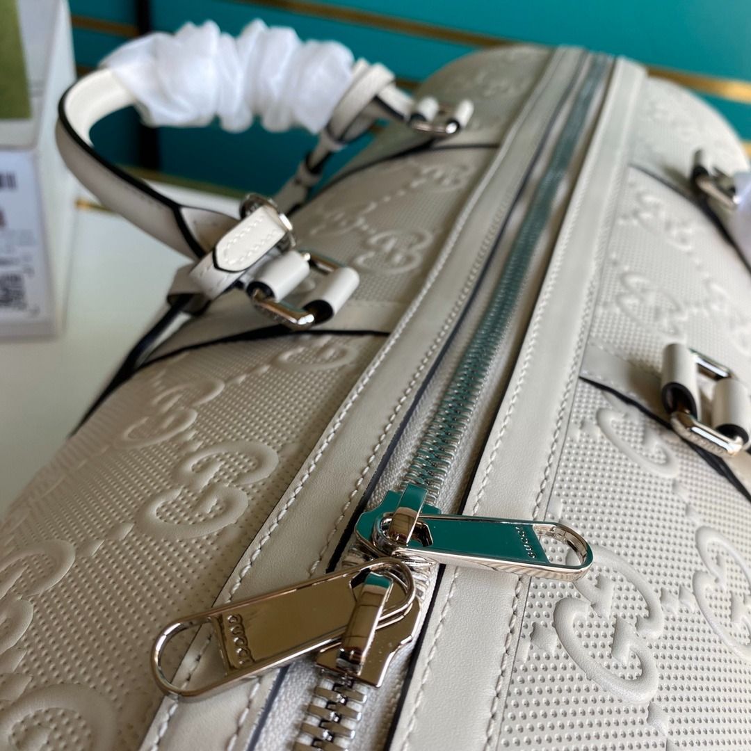 Gg embossed duffle bag best sale