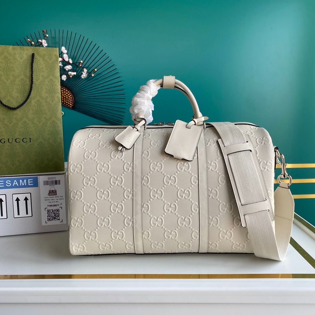 Gg embossed hot sale duffle bag