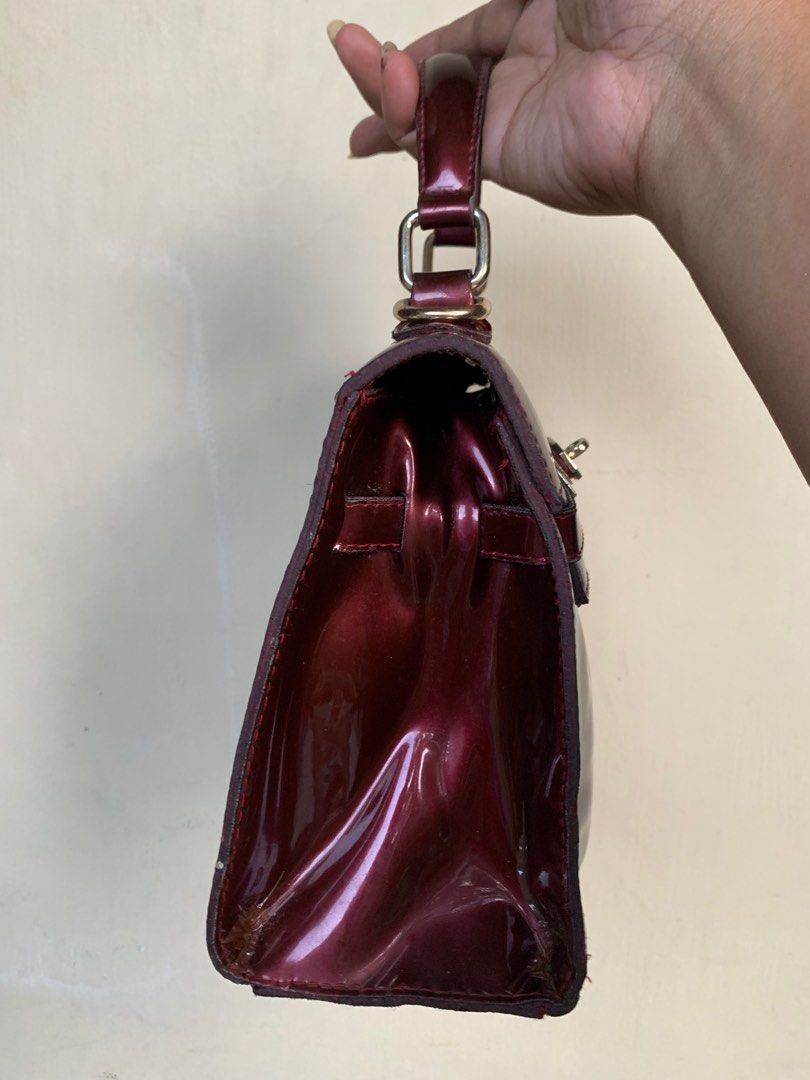 KELLY BAG. RED PATENT (Category: Luxury Bags & Wallets) located in Quezon City. Submitted by WIMC2ndaccount (Listing ID 1272754626, Image 3). Description: ☑️Vintage ☑️22 x 19 CM ☑️Good Condition 🔴manage your expectations this is Second hand / Vintage Item Hindi Brand new Binibili mo. CHECK THE PHOTOS UPLOAD. 🔴BAWAL NA BAWAL SA MAARTE.. 🔴NO RETURN. NO EXCHANGE 🔴Please ask all necessary questions before making an OFFER so as not to feel misled 