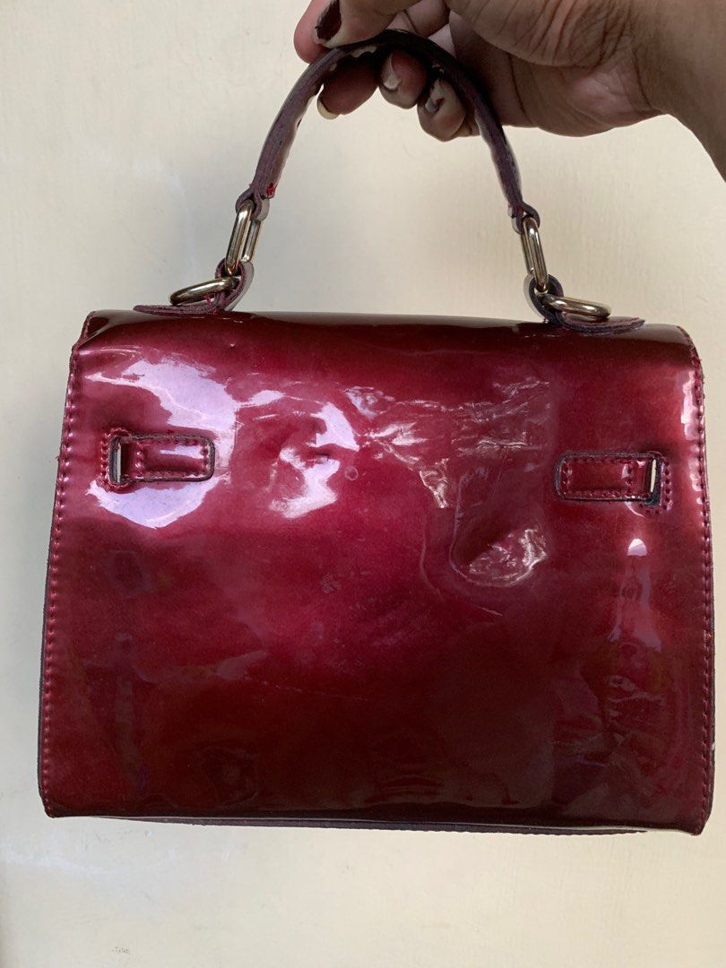 KELLY BAG. RED PATENT (Category: Luxury Bags & Wallets) located in Quezon City. Submitted by WIMC2ndaccount (Listing ID 1272754626, Image 2). Description: ☑️Vintage ☑️22 x 19 CM ☑️Good Condition 🔴manage your expectations this is Second hand / Vintage Item Hindi Brand new Binibili mo. CHECK THE PHOTOS UPLOAD. 🔴BAWAL NA BAWAL SA MAARTE.. 🔴NO RETURN. NO EXCHANGE 🔴Please ask all necessary questions before making an OFFER so as not to feel misled 