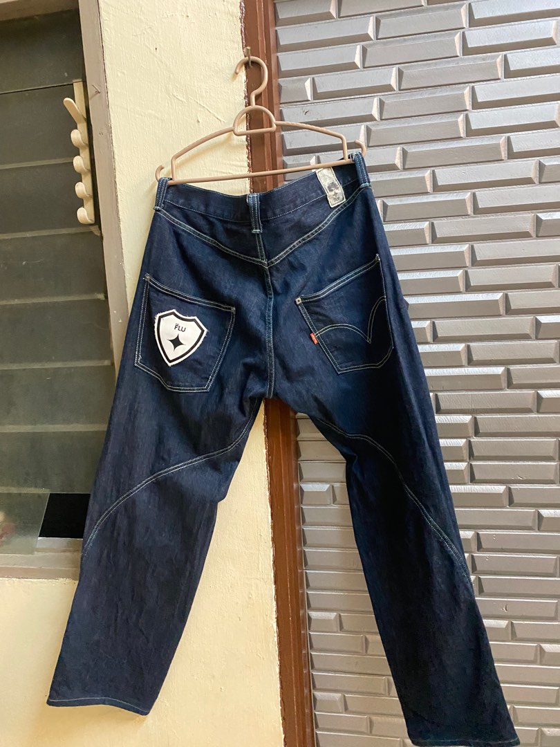 levis x flu jeans logo, Men's Fashion, Bottoms, Jeans on Carousell