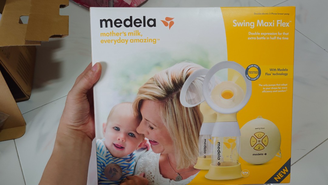 Medela breast feeding bra, Babies & Kids, Nursing & Feeding, Breastfeeding  & Bottle Feeding on Carousell