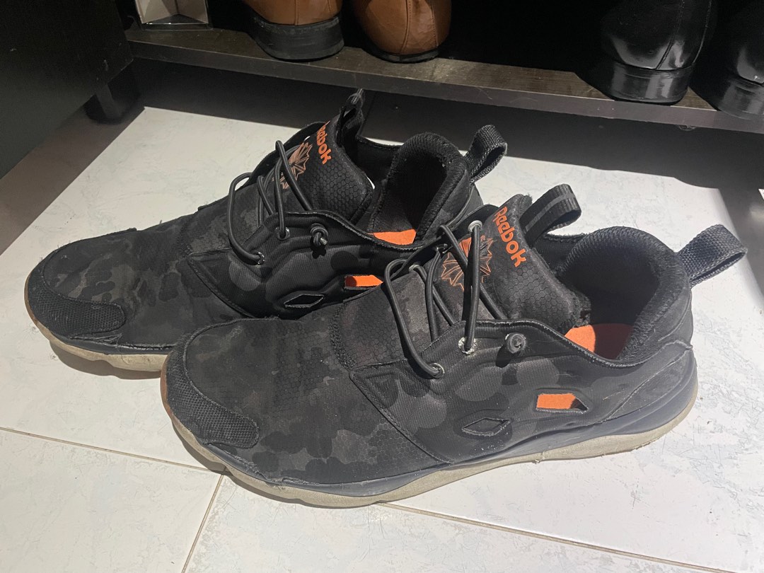 Reebok black top orange shoes