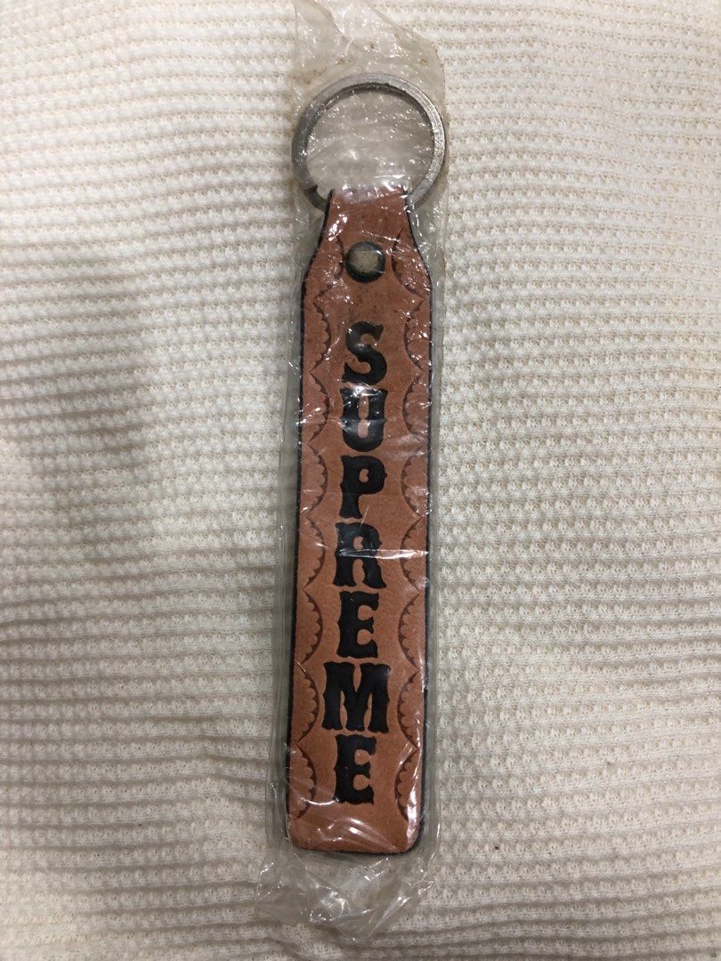 Fake new arrivals supreme keychain