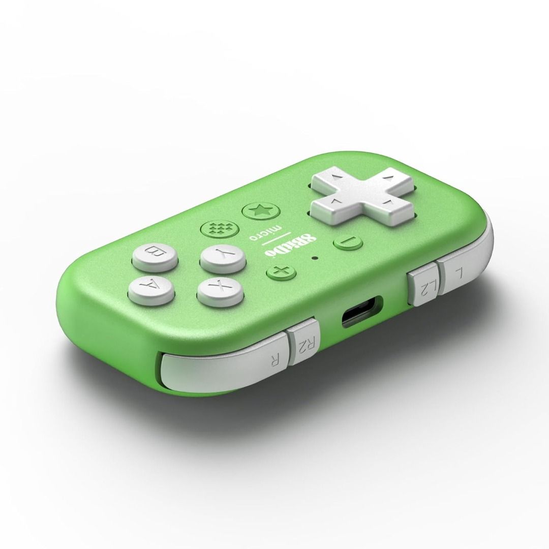 8Bitdo Micro Bluetooth Gamepad Pocket-sized Mini Controller for Switch, Android, and Raspberry Pi, Supports Keyboard Mode (Category: Controllers) located in Las Pinas. Submitted by techsmartph (Listing ID 1273014934, Image 3). Description: * Weighs 24.8 grams featuring 16 buttons. Ultra-portable and versatile. * Compatible with Switch, Android, and Raspberry Pi * Supports firmware update * Mode switching button * Supports button mapping in 8BitDo