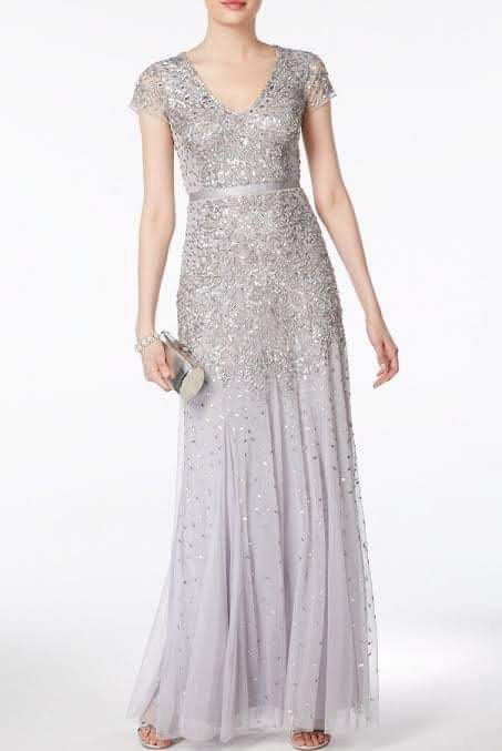Adrianna Papell Silver elegant Gown (Category: Evening dresses & gowns) located in Manila. Submitted by chelseaaudrey (Listing ID 1273135378, Image 1). Description: Used once for Christmas party Size: small Made in the US.