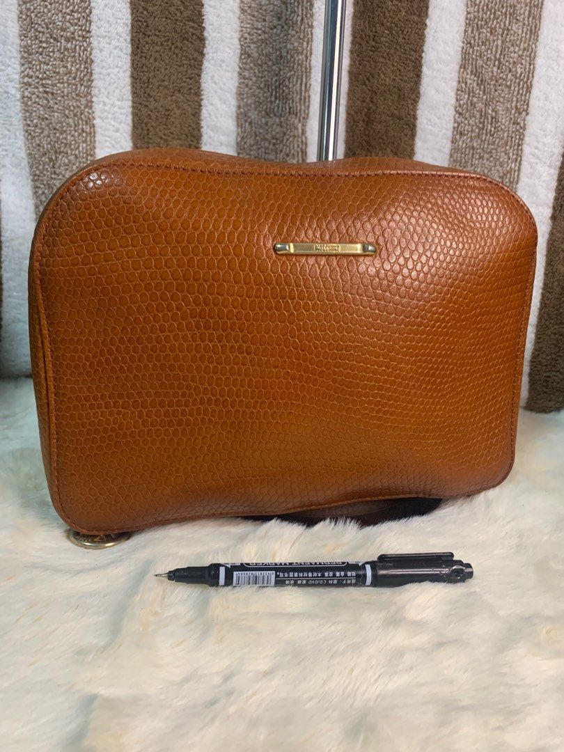 Auth vintage leather moschino clutch bag (Category: Luxury Bags & Wallets) located in Cabanatuan. Submitted by mjluxxejapan (Listing ID 1273142268, Image 1). Description: NO LP PLS.good cond.genuine leather.approx 10.5”x8” meas.cute and pretty in actual.minimal signs of use as normal due to its aged.(small dirts on bottom) .