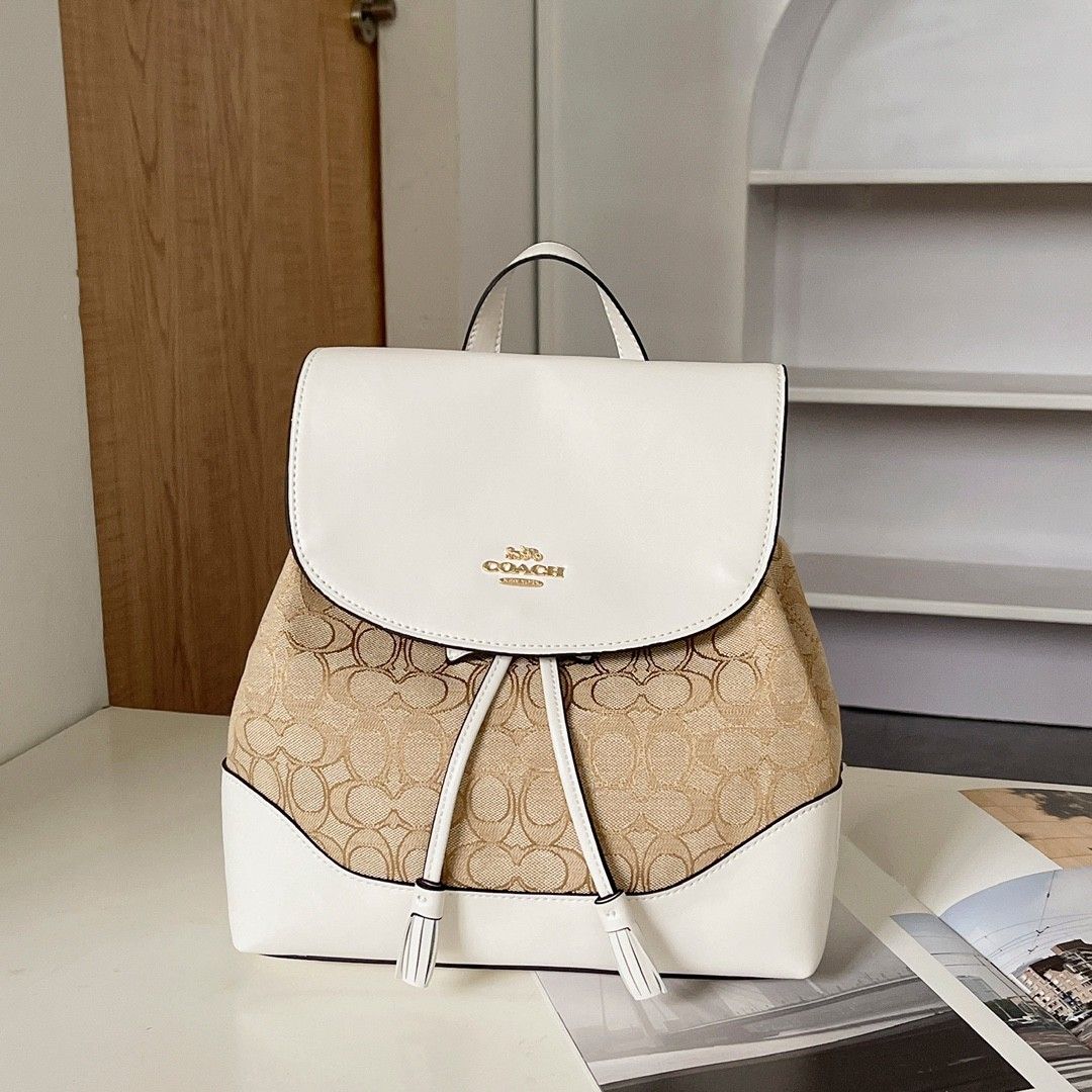 coach elle backpack white Leather Tote - #F72645 Refined pebble leather Inside zip and multifunction pockets Drawstring and snap closures fabric lining Top handle with 3 1/4 drop Adjustable shoulder straps 9 3/4 (L) x 10 3/4 (H) x 3 1/4 (W) Style No. Leather Elle Backpack In Signature